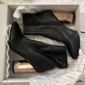 Beautiful Aldo booties. Worn once.